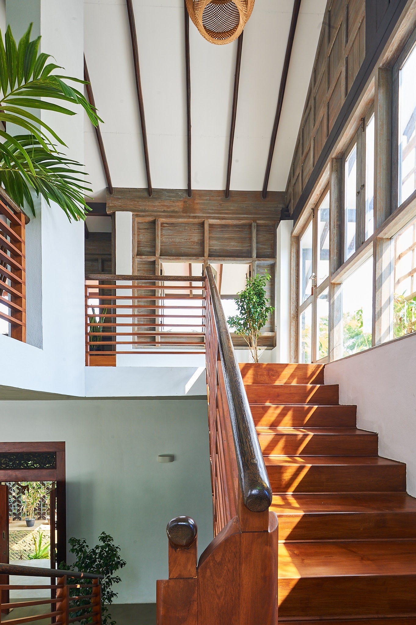 Upper floor sitting area with colored panel feature wall